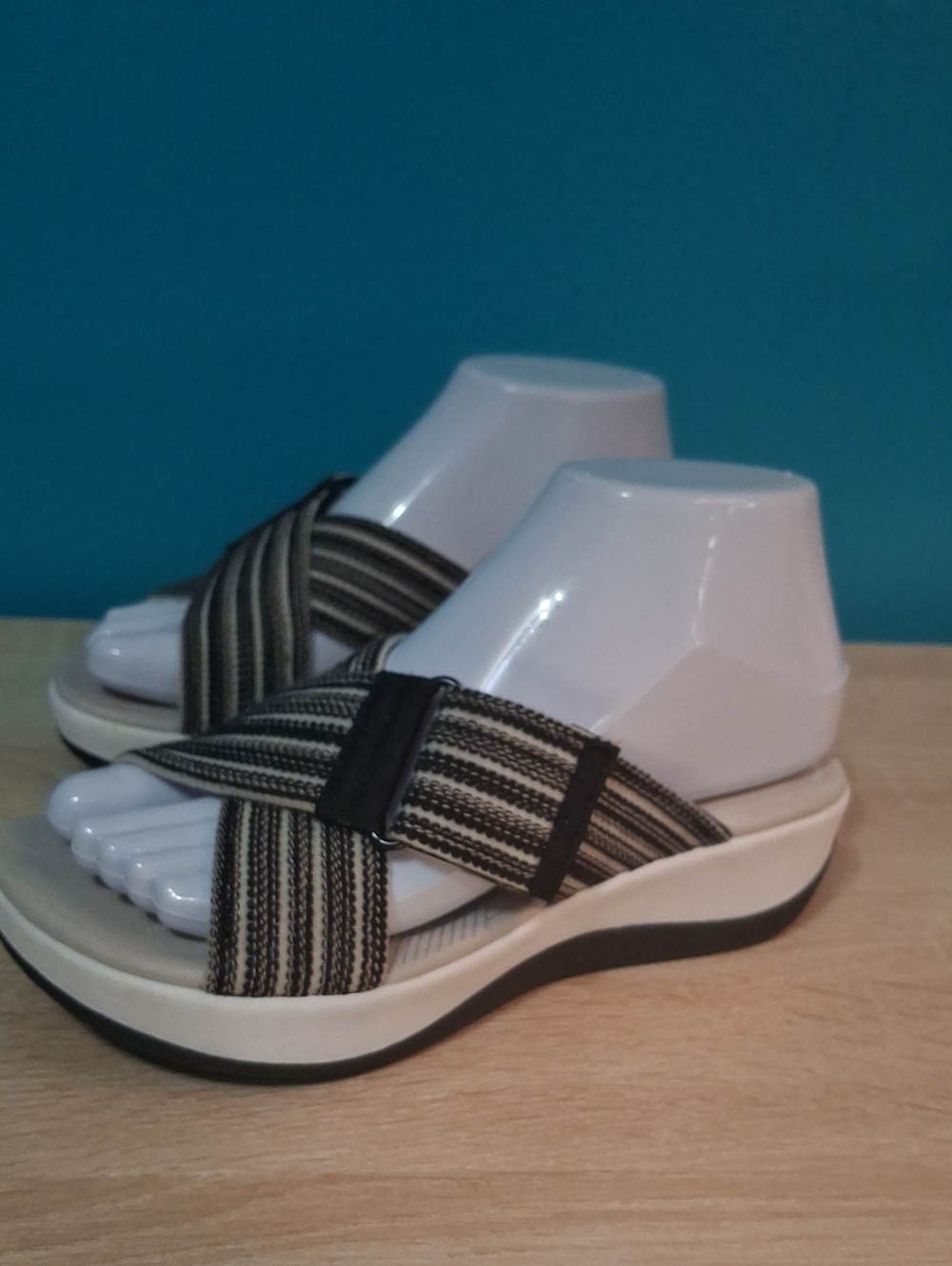 Cloudsteppers by Clarks Arla Wave Black/Cream Striped Cross-Strap Wedge Sandals